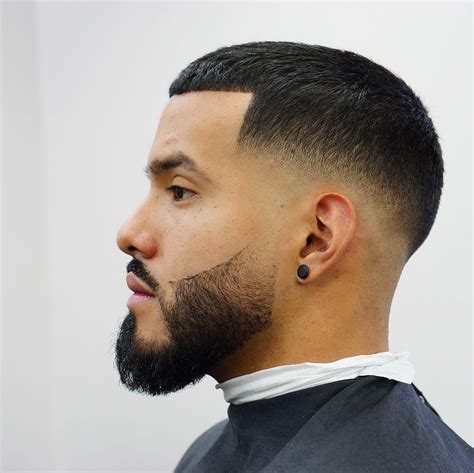 Buzz cut mid fade with beard. A mid fade haircut is a gradual haircut popular for its softness and modern look. The mid fade can be styled with a skin fade for an aggressive look or any other haircut type. The mid fade is an all-rounder which can work with any hair length on top of your head. A mid fade haircut can be paired with any style of hair. 