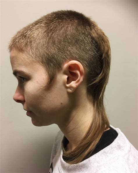 The skin fade mullet is a modern and bold hairstyle that combines the distinctive long back of a mullet with the sharpness of a skin fade. This haircut is edgy as it just involves sharp angles. Skin fade mullet haircut is perfect for formal events and business. 16. Faux hawk mullet.. 
