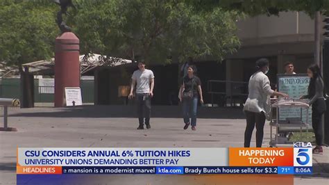 CSU workers rally for pay hike outside board's tuition increase vote