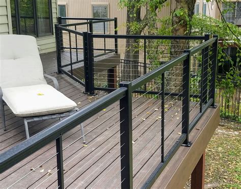 Cable deck rail. Cable deck railing is made up of posts with stainless steel cables that run between them and are tightened into place. Cables offer a clean modern aesthetic and are often paired with railing posts made of aluminum, wood, composite, or vinyl. While many traditional railings block the surrounding view, cable rail’s narrow profile and gray ... 