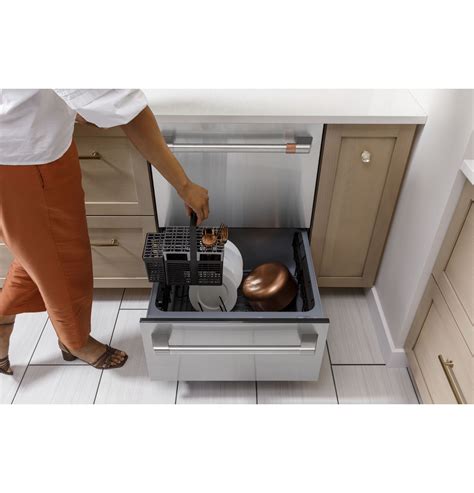 Cafe dishwasher. As of 2014, the main difference between the GE Cafe and GE Profile series is the style of the appliances. The GE Cafe series has robust door handles, large control dials and a stur... 