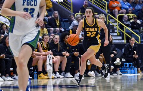Caitlin Clark scores 21 and No. 5 Iowa makes 20 3s to roll past Florida Gulf Coast 100-62