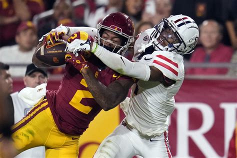 Caleb Williams finds the end zone once more in triple OT, and No. 9 USC survives Arizona 43-41