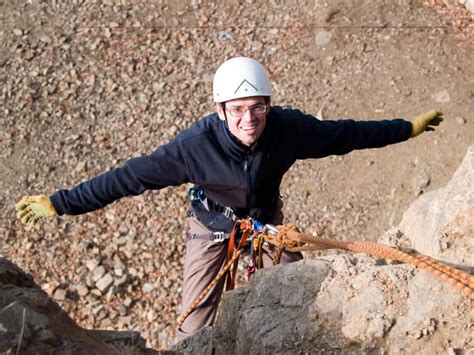 Calgary climbing centre belay test.  Rappelling and advanced techniques require ...