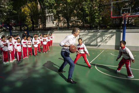 California’s Newsom plays hardball in China, collides with student during schoolyard basketball game