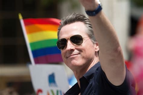 California Gov. Gavin Newsom signs bills to enhance the state’s protections for LGBTQ+ people