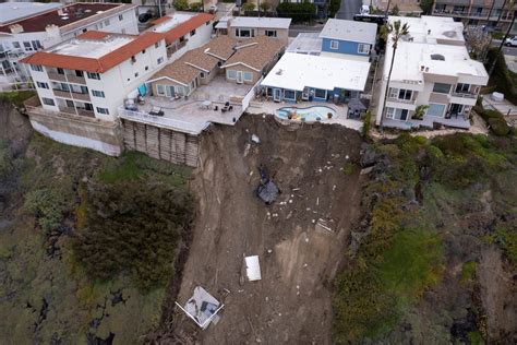 California buildings still in peril from tumbling cliff