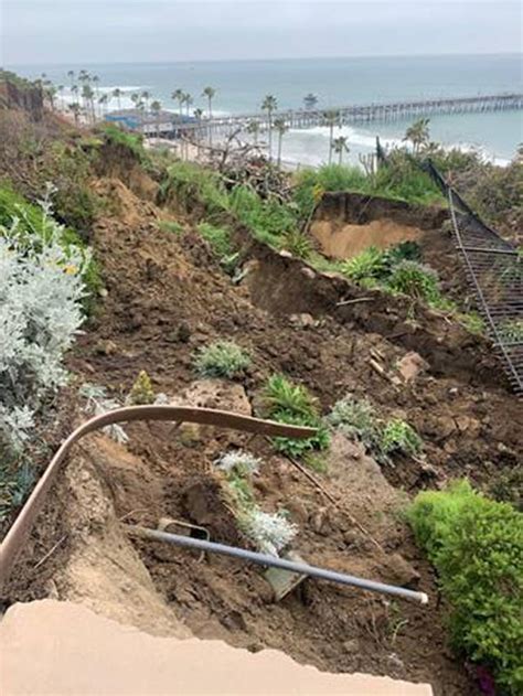 California landslide halts rail service, homes evacuated