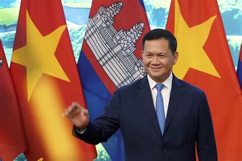Cambodia’s leader holds talks in neighboring Vietnam on first visit since becoming prime minister