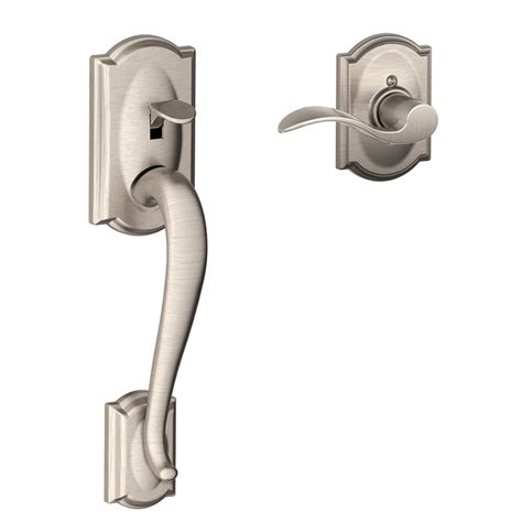 Camelot door handle. Schlage Camelot Handle Set Specs: - Replaces virtually any existing lock. - Easy installation: One-person project; no extra hands needed. - ANSI Grade 2 with maximum security features. - Lifetime finish and mechanical guarantee. - Designs and finishes to match any home's architectural style. - Lifetime brass finish is on the exterior of the ... 