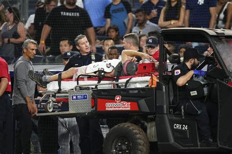 Cameraman injured at Yankee Stadium by wild throw has broken eye socket