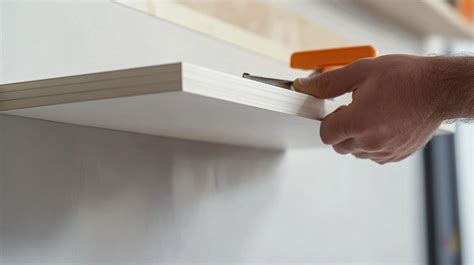 Can I hang floating shelves without studs