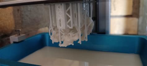 Can I refill the vat with resin halfway through a print?