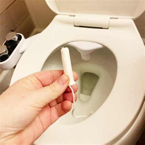 Can You Flush Tampons Down the Toilet? Experts Explain - Parade