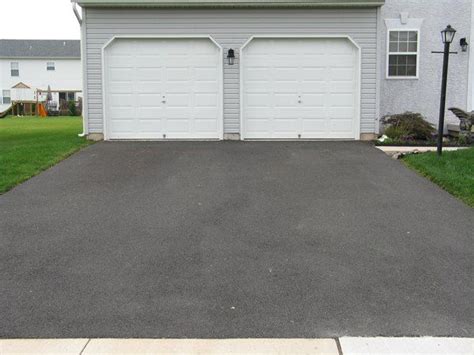 Can You Use a Paint Roller to Put on Driveway Sealer? Hunker