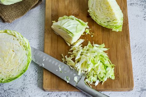 Can you freeze raw cabbage. With a sharp knife, dice, slice, or shred the cabbage. However, you can always freeze the whole cabbage with the bulb intact. Freezing whole cabbage will help keep them fresh longer. Blanch the cabbage in boiling water for 2-3 minutes. Transfer the cabbage immediately to a bath of ice water. 