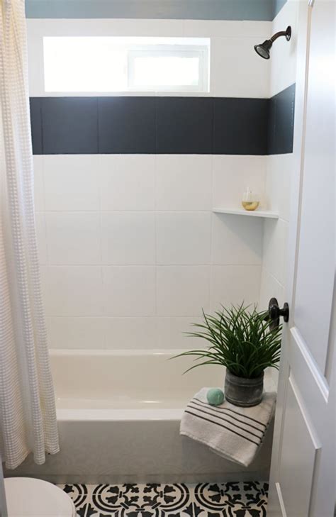 Can you paint shower tile. Additional Ideas to Modernize Your Vintage Bathroom. Add accessories like a glass soap dispenser or a basket for towels. Candles. Fresh flowers in a vase or a small potted plant. Swap out the old toilet for a modern, low-flow option. Update the toilet handle for a modern look. Add a fun bath mat. 