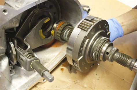 The NP 207 is not strongest transfer case by any means. The NP 207 has an aluminum case and chain driven planetary reduction. The NP 207 has a 2.60:1 low range and a straight through designed high range, the drop is on the driver side front output. It was used in one year of the Jeep YJ Wrangler 1987, and in the early XJ Cherokee's from 1984-1987.. 