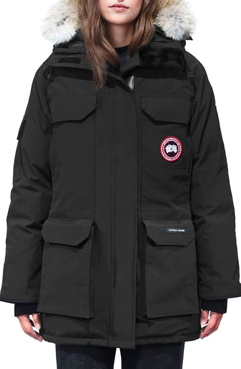 Canada Goose parkas are identified by the round two-inch patch on the left sleeve and the coyote fur–trimmed hood. Photo by Flickr contributor Nelson Wu. Look anywhere this winter and chances are you can find someone wearing a Canada Goose down jacket, parka, or vest.