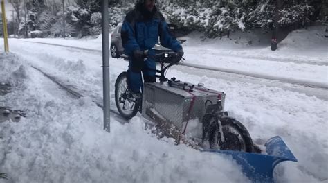 Canadian man built this DIY e-bike snow plow to clear bike lanes