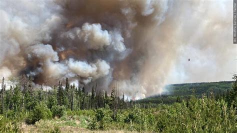 Canadians fighting wildfires see hope in improving weather conditions