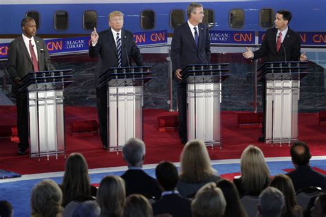 Candidates in the second GOP debate attack each other and Trump — even though he's absent