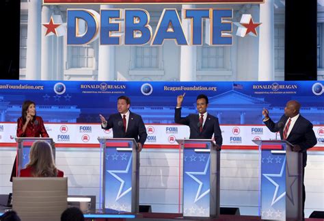 Candidates in the second GOP debate attack each other and Trump — even though he’s absent
