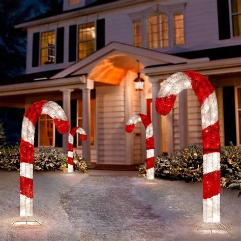 Christmas magnetic decorations set of 30 vibrant candy canes. These fun Christmas decorations are durable and weatherproof magnet candy cane shapes. Cut from a 0.03" magnet material the shapes are flat not 3D. This is a great Christmas decoration. Candy cane measurements are approximately 4.8" wide by 12" high.. 