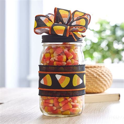 How cute! Mason jars are good for so many things. I love the look of candy corn but if I filled a jar full of candy corn I could keep it year after year! Now chocolate is a different story, I found your blog from Sugar Bee-thanks for choosing my Witchy Pillow, she is a cutie!. 