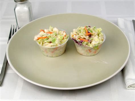 Canes coleslaw calories. The exact link to the food presented on this page can be found below. Coleslaw nutrition (100 grams). Richest in Polyunsaturated fat: 5g (% of DV), Vitamin C: 15mg (16% of DV). Glycemic Index: 39, Calories:153, Net carbs: 12.99, Protein: 0.95. 