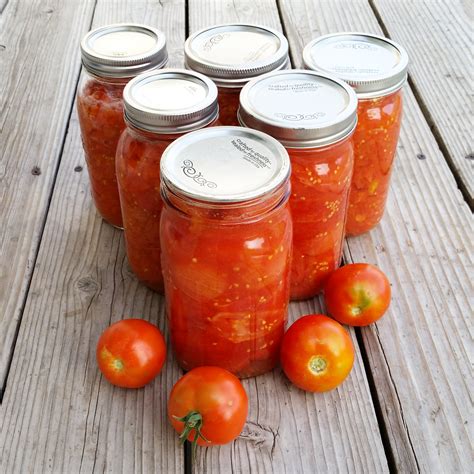 Canning tomatoes. Jun 12, 2016 · Use a wooden spoon or a spatula around the inside of the jar to get rid of any air bubbles. Add 1 teaspoon of salt and 2 tablespoons of lemon juice to each jar. Wipe down the jar rims and place new lids on jars and screw on. Process the jars by placing them in a water bath canner in boiling water for 45 minutes. 