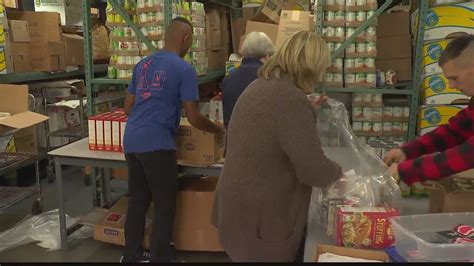 Capital City Rescue Mission packs Thanksgiving food boxes for families in need