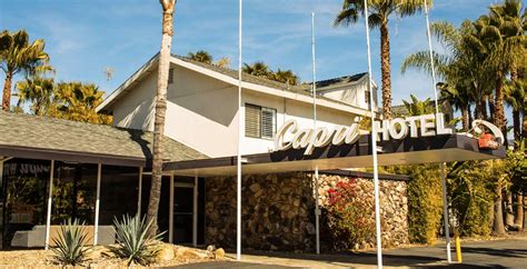 “Renovated 1960s motel, now a stylish and tranquil West Coast retreat. Rooms are light and airy and designed with local artists and makers. There's a lovely lawned garden bedecked with fairy lights, pool and hot tub, complimentary bikes and fire pit for sociable evenings.. 