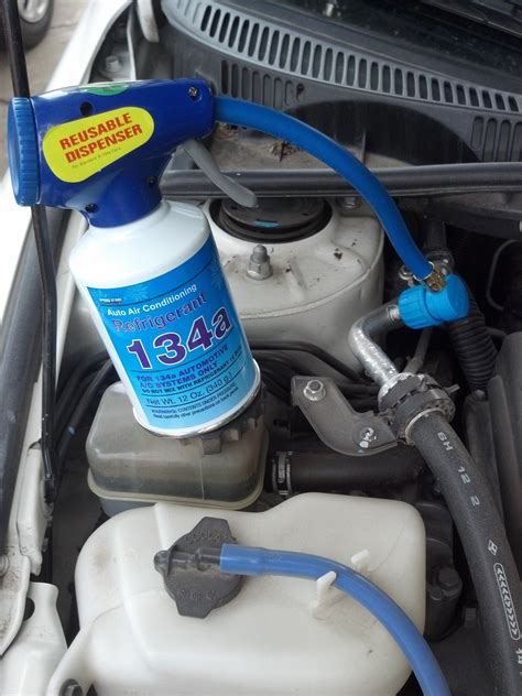 Car air conditioner recharge. Attach Can of Refrigerant. Screw the dispenser hose and gauge onto the can of refrigerant. Attach to the low side port by pulling back the outer slip ring, pushing it on and releasing the ring. Next, start the engine, turn the A/C system on max and check the gauge reading. The compressor clutch should be engaged and the front of the compressor ... 