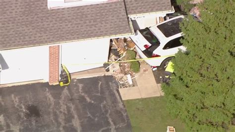 Car crashes into townhome in Glenview