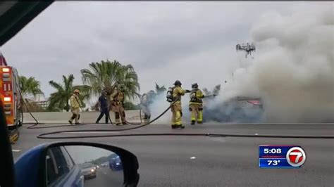 Car engulfed in flames on Dolphin Expressway in NW Miami-Dade