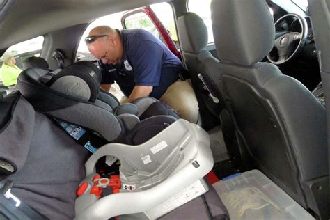 Car seat inspection by Colonie Police Department