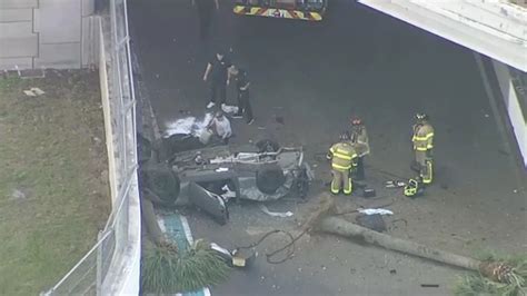 Car severely wrecked after falling over I-95 ramp in NW Miami-Dade