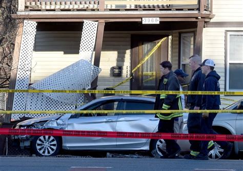 Car slams into Roslindale porch, Boston Police investigating serious accident