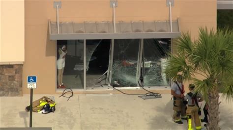 Car slams into sportswear store in Miami Gardens