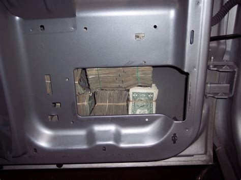 Car traps hidden compartments. In some of the impounded vehicles, traffickers have installed hidden compartments, trap doors and fake sidewalls to hide drugs, drug profits and the arms they use to protect them. 