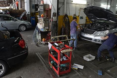 Car workshops hit by labour crunch The Straits Times