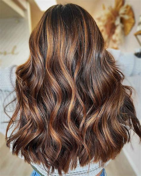 Caramel Highlights: Transform Your Brown Hair with Sun-Kissed Brilliance