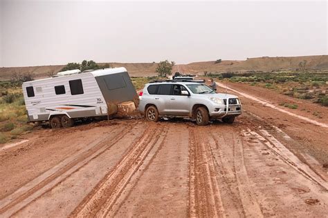 Caravans bogged on Oodnadatta Track as heavy rains fall