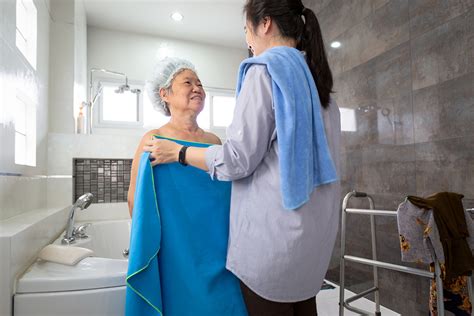 Caregiver bathing a patient. Additional time is required if help is needed to bathe your loved one after a urine or bowel accident. As personal care takes more and more time, you may find yourself growing less patient and more frustrated. These feelings are only compounded if cleaning and bathing demands occur throughout the night leaving the caregiver without adequate sleep. 