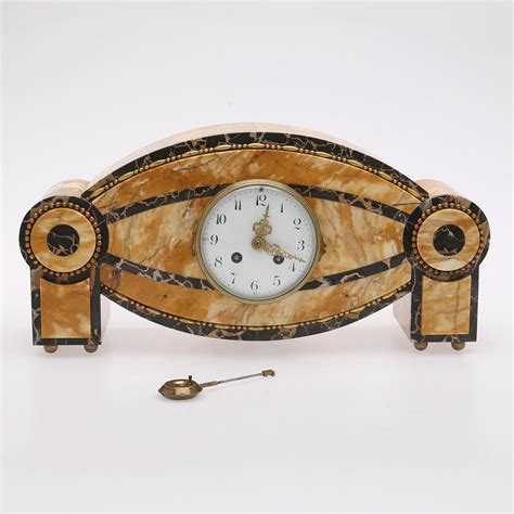 Carlo Bugatti Style Art Deco Marble Clock - 1stDibs.com