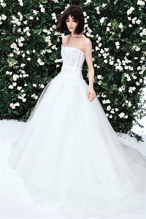 Carolina herrera wedding dress. The Dress. Couture Carolina Herrera wedding gown GORGEOUS fits like a glove! Zero alterations, beautiful teared silk, petticoat underneath. Dry cleaned, looks never worn (was only worn for 6 hrs). This is a dream wedding dress. 