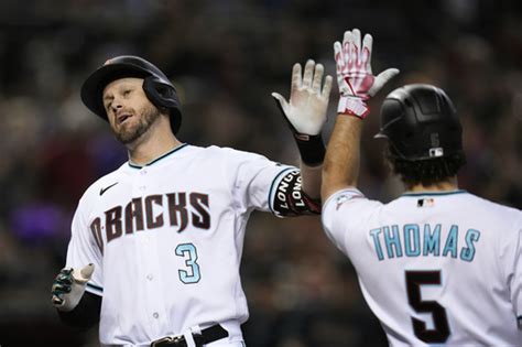 Carroll and Walker hit back-to-back homers to spark the Diamondbacks past the Rays 8-4