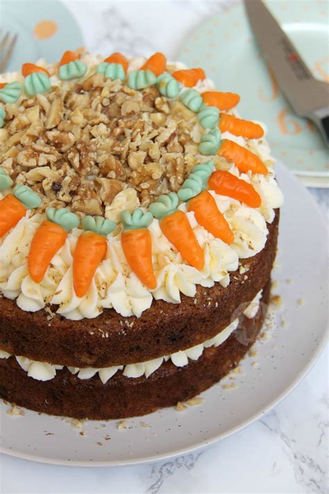 Carrrott_cake. Mar 26, 2019 · Bake at 350 degrees for 40-45 minutes or until an inserted toothpick in the center comes out clean. Allow the cake to cool down completely. Then, ice it in cream cheese frosting. Decorate, using the round tip and star tip. Sprinkle chopped walnuts along the bottom of the cake. Enjoy! 