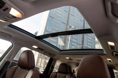 Cars with moonroof. A moonroof is a tinted glass panel in the roof of a car. It may or may not tilt or slide to allow air into the cabin. Some manufacturers use the term “moonroof” interchangeably with “sunroof ... 